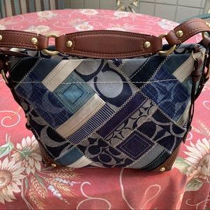 Nice color and good brand coach shoulder bag.